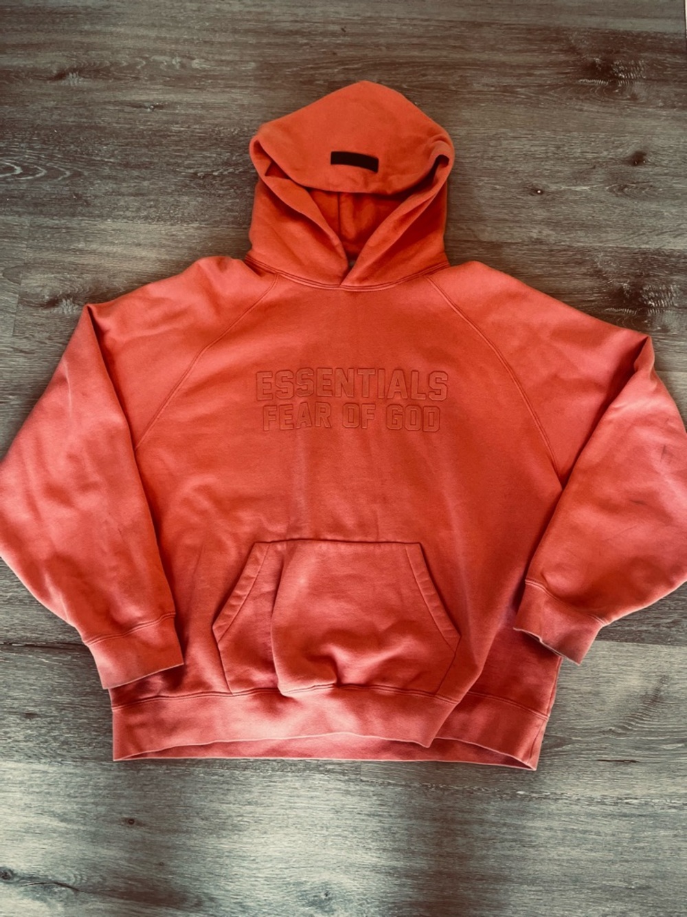Fear of God Essentials Hoodie in Coral